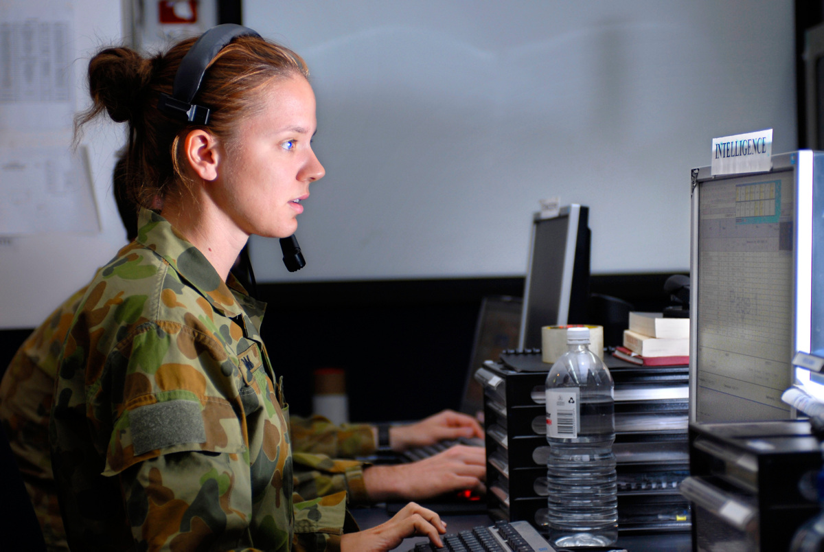 Lieutenant Emma Grigson keeps watch on a "battle tracking" console in the Live Instrumentation System Exercise Control Centre.