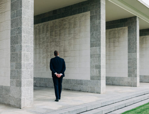 Minister pays respects at Singapore war memorial