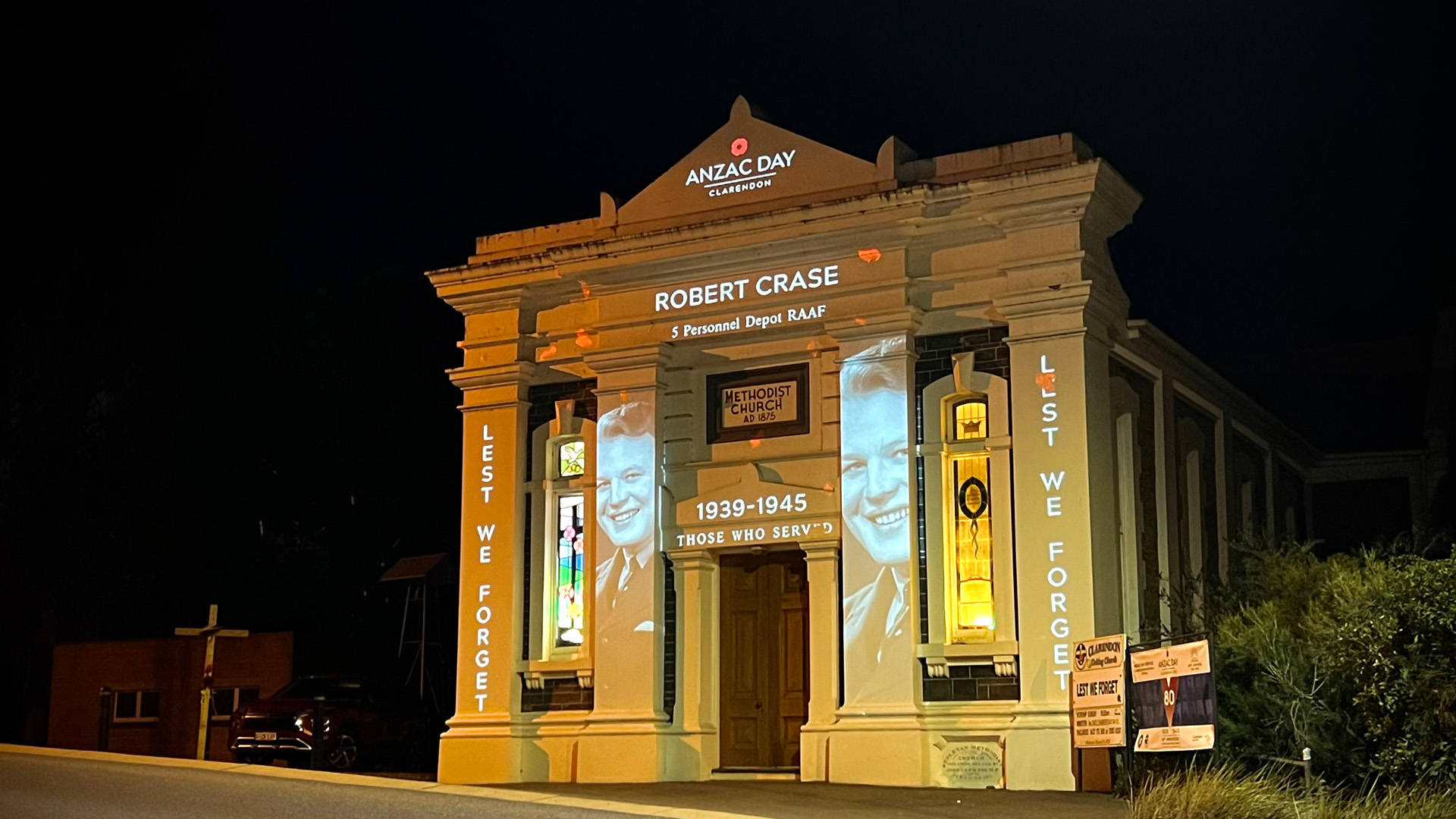 The Clarendon Uniting Church, built in 1875, was the perfect backdrop to project the names and faces of servicemen from Clarendon who served in WWII during the Light Memorial event.